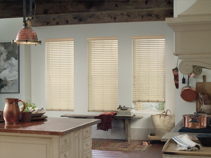 A kitchen with copper countertop.